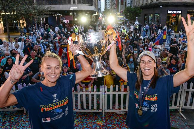 AFLW Premiership winners the Adelaide Crows star Erin Phillips and captain Chelsea Randall with the Premiership cup at the meet and greet with fans at Rundle Mall in Adelaide. Picture: NCA NewsWire / Brenton Edwards