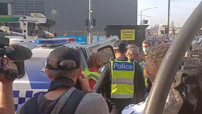 Extinction Rebellion protesters shut down trams and cause traffic chaos on the corner of Flinders and Swanston streets in Melbourne's CBD. Picture: Facebook