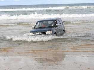 This Prado gets it feet wet going through the Mudlo Rocks over Easter. Picture: Craig  Warhurst