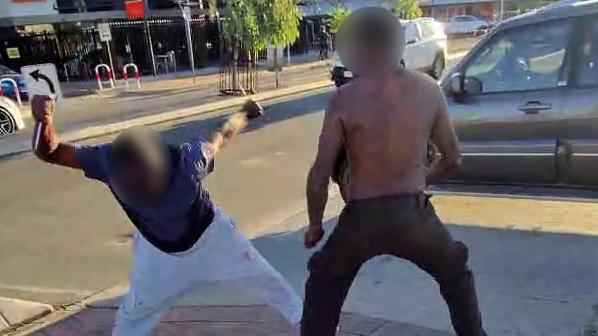 The man in the blue shirt allegedly attempted to stab a second person. Picture: Supplied
