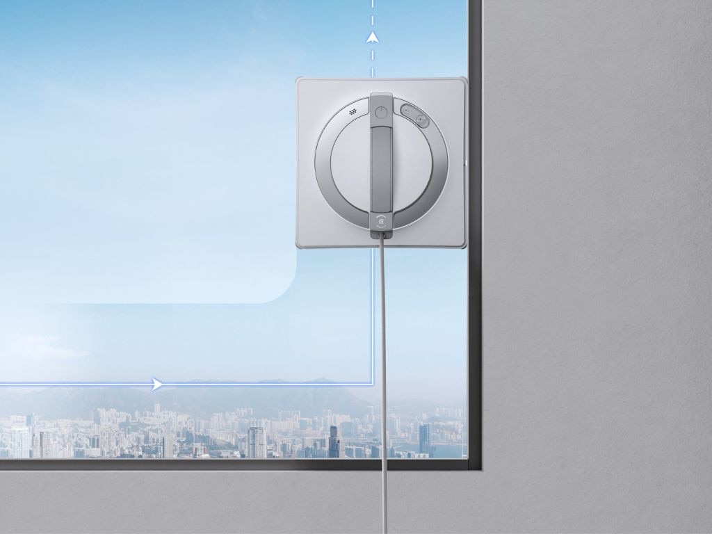 The robot cleans right to the edge of the window, but can’t clean over obstacles. Picture: Ecovacs.