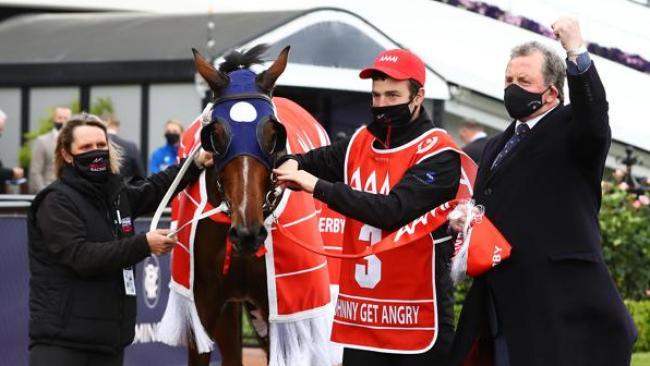 Denis Pagan with VRC Derby winner Johnny Get Angry.