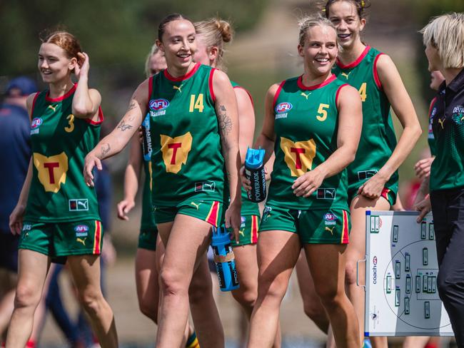 Devils players Kelsie Hill, Perri King, captain Sarah Skinner and coach Jodie Clifford after their win over Norwood at the Twin Ovals. Picture Solstice Digital