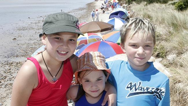 Monique, Natasha and Brandon Acton enjoy a day out at Rosebud beach. 