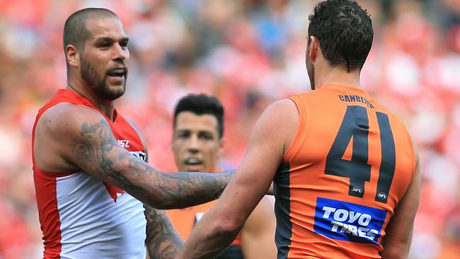 Lance Franklin and Shane Mumford push and shove. Picture: Toby Zerna