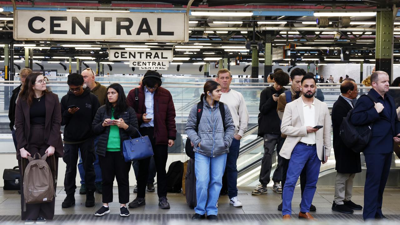 Commuters wait for a train at Central Station on Wednesday night. Picture: Jonathan Ng