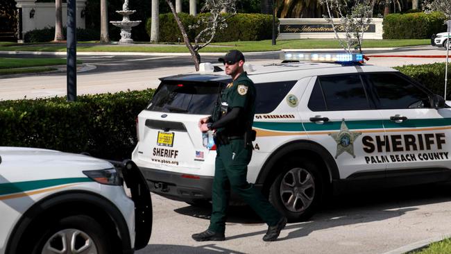 WEST PALM BEACH, FLORIDA - SEPTEMBER 15: Law enforcement secures the area around Trump International Golf Club after an apparent assassination attempt of former President Donald Trump on September 15, 2024 in West Palm Beach, Florida. The FBI and U.S. Secret Service, along with the Palm Beach County Sheriff's office, are investigating the incident, which the FBI said "appears to be an attempted assassination of former President Trump' while he was golfing at Trump International Golf Club.   Joe Raedle/Getty Images/AFP (Photo by JOE RAEDLE / GETTY IMAGES NORTH AMERICA / Getty Images via AFP)