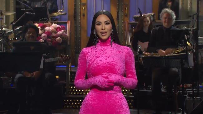 Kim Kardashian West, wearing hot pink Balenciaga, during her monologue on Saturday Night Live. Picture: SNL