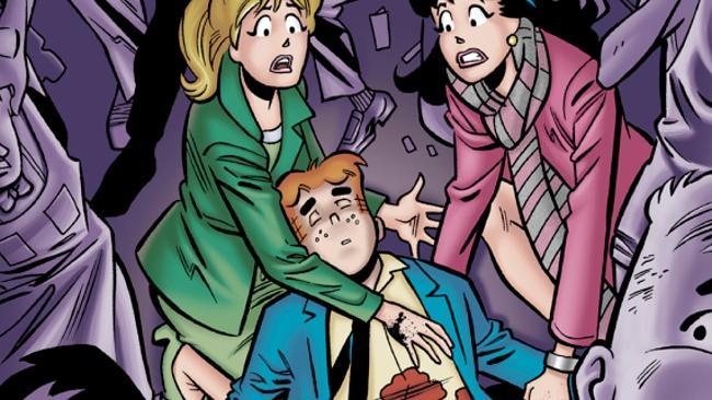 Death becomes him ... Betty and Veronica look over their beloved Archie Andrews who will die in the new Life With Archie comic.