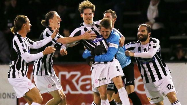 Tremayne Sadler celebrates his goal in extra-time.