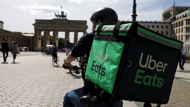 Uber’s food-delivery business became larger than its ride-hailing business during the health crisis, delivering everything from groceries to alcohol. Above, the Brandenburg Gate in Berlin. Picture: Bloomberg