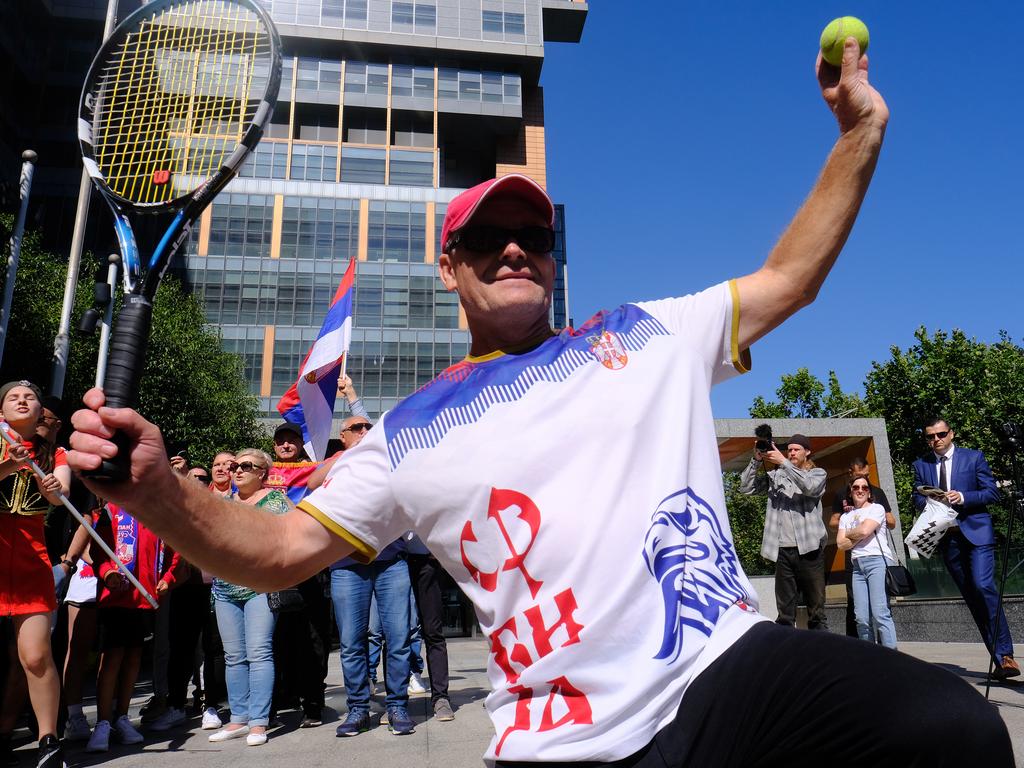 A Serbian tennis fan showed off his tennis skills as lawyers battled to keep World No.1 Novak Djokovic in the country. Picture: NCA NewsWire / Luis Enrique Ascui