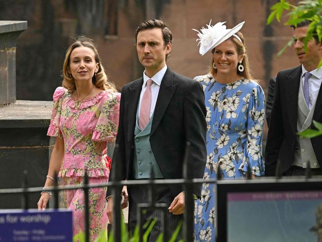 William and Harry’s friend Charles van Straubenzee (2L) and his wife Daisy Jenks (L) arrive. Picture: Oli Scarff/AFP