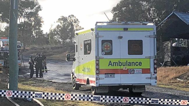 Emergency services responding to a house fire on the corner of Lakes Creek Rd and Hill St, Rockhampton.