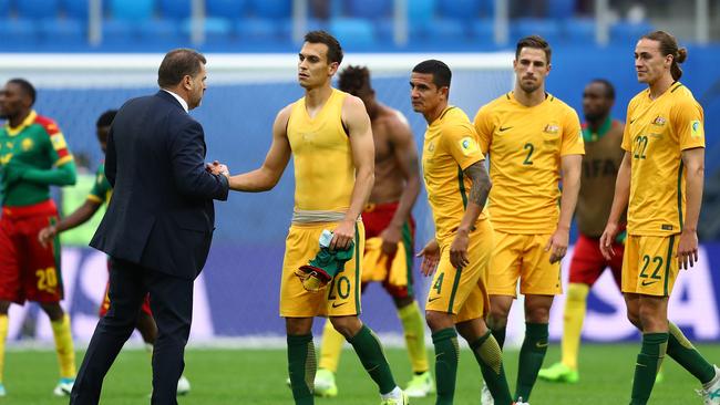 Ange Postecoglou manager of Australia shakes hands with Trent Sainsbury.