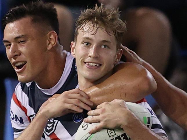 NEWCASTLE, AUSTRALIA - MAY 01: Sam Walker of the Rooster celebrates his try with team mates during the round eight NRL match between the Newcastle Knights and the Sydney Roosters at McDonald Jones Stadium, on May 01, 2021, in Newcastle, Australia. (Photo by Ashley Feder/Getty Images)