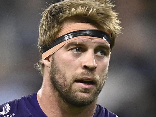 TOWNSVILLE, AUSTRALIA - JUNE 04: Christian Welch of the Storm looks on during the round 14 NRL match between North Queensland Cowboys and Melbourne Storm at Qld Country Bank Stadium on June 04, 2023 in Townsville, Australia. (Photo by Ian Hitchcock/Getty Images)