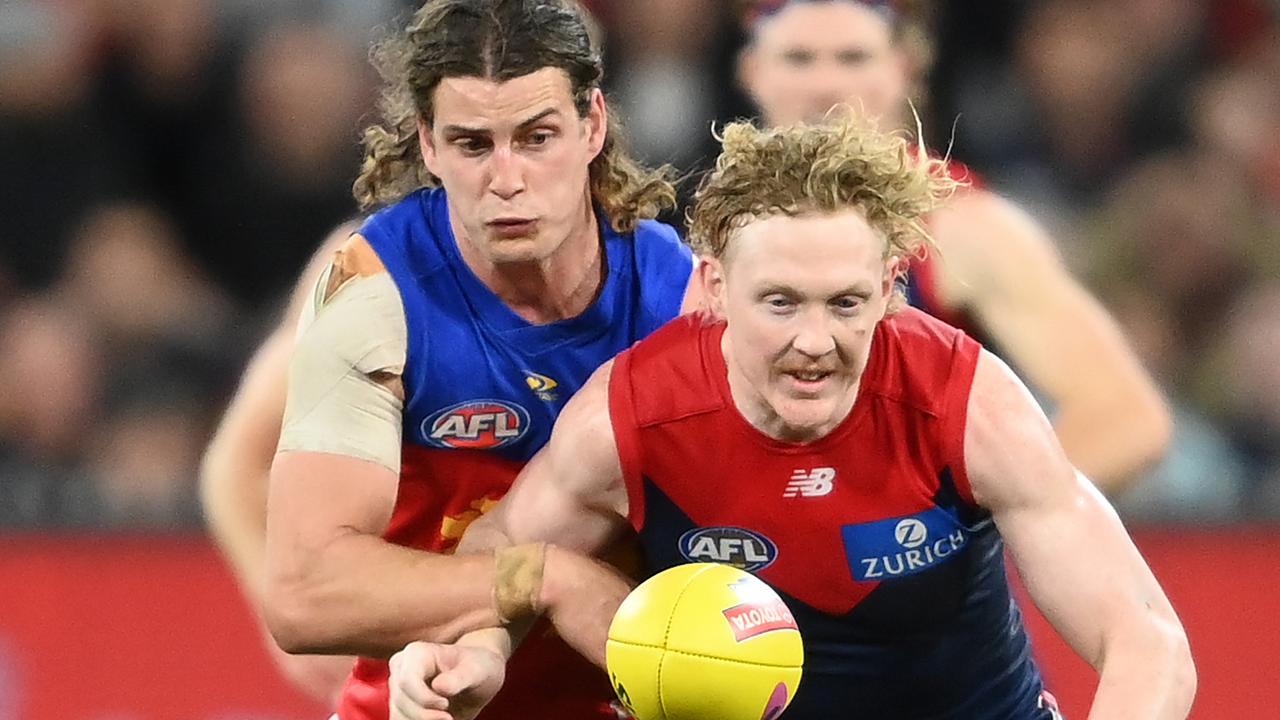 Jarrod Berry and Clayton Oliver compete for the ball during the second semi-final on Friday night.