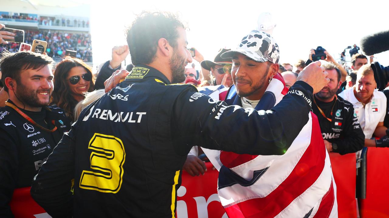 Daniel Ricciardo embraces world champion Lewis Hamilton after the race. Picture: Dan Istitene