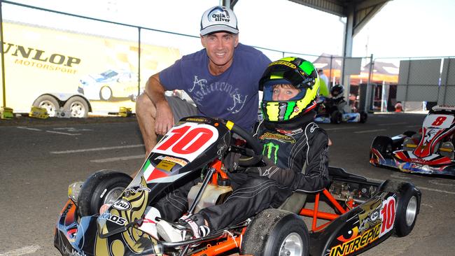 Jack Doohan as a rookie karter with his dad, former motorcycle champion Mick Doohan.