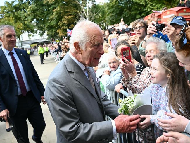 The King greeted locals and offered his condolences. Picture: Getty Images