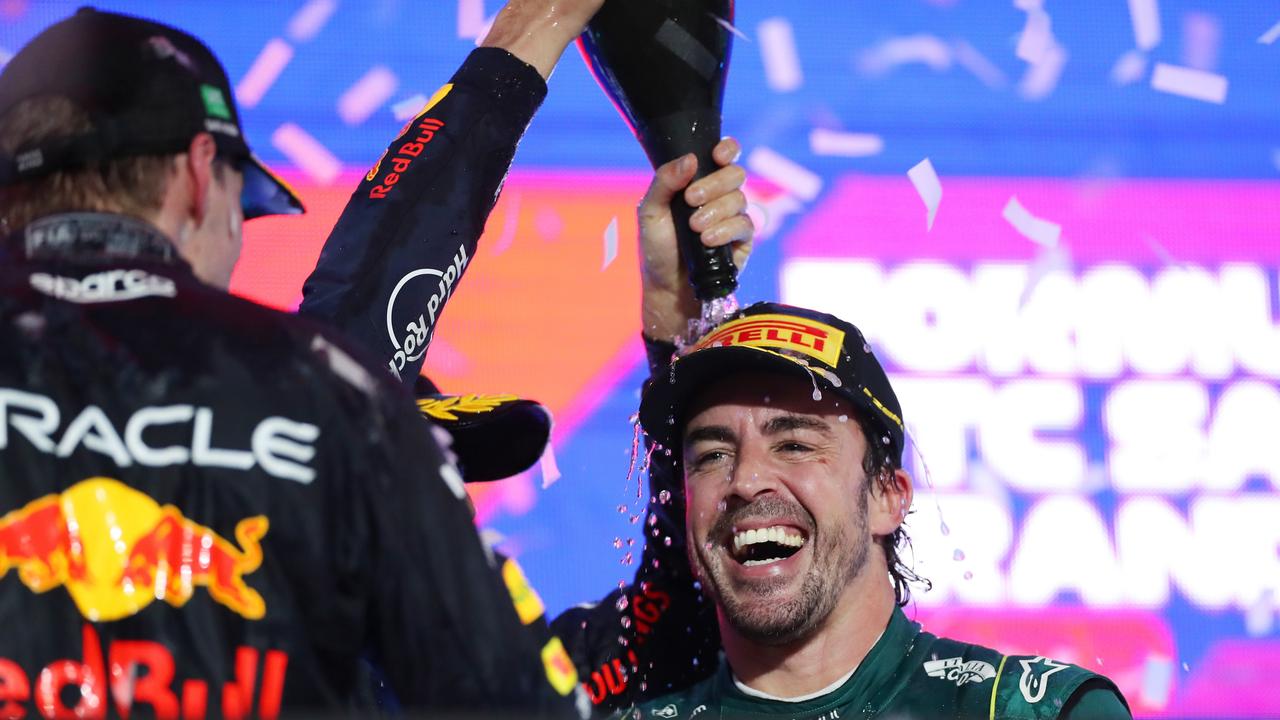 Third placed Fernando Alonso celebrates on the podium. Picture: Getty