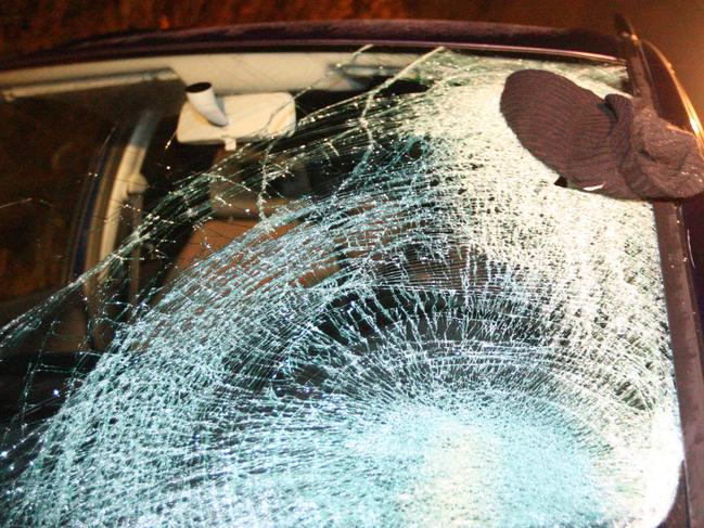 Car with broken windshield after crash with pedestrian