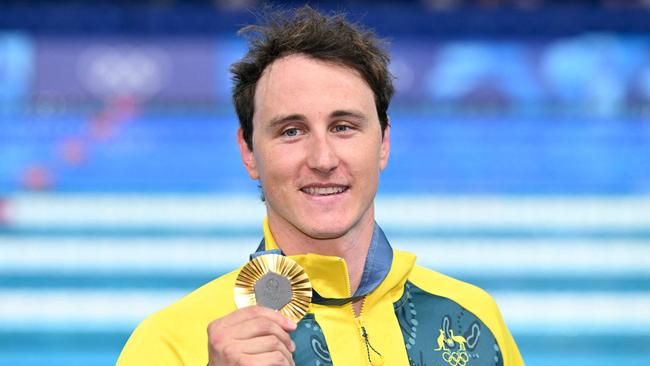 Cameron McEvoy poses with his gold medal for the men's 50m freestyle swimming event at the Paris 2024 Olympic Games. Picture: Jonathan Nackstrand/AFP