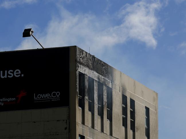 Smoke escapes as a drone surveys the scene after a fire at Loafers Lodge. Picture: Getty Images