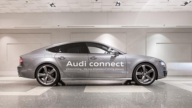 Policing you ... Audi has installed an anti-fatigue camera under the rear-view mirror to detect when the driver nods off.