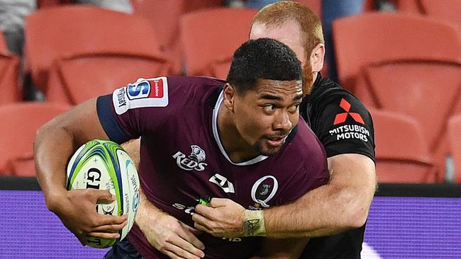 Chris Feauai-Sautia does his best to break through the Sunwolves defence. Picture: AAP Image/Dan Peled