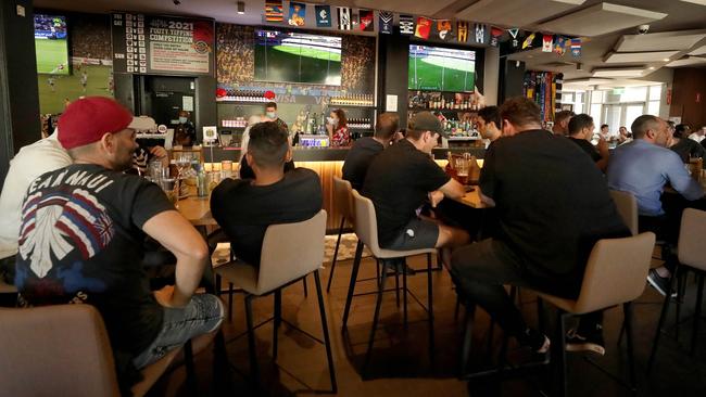 AFL fans watch the West Coast v Fremantle match at the Hyde Park Hotel in Perth on Sunday. Picture: Colin Murty