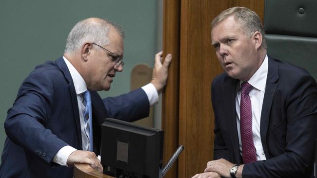 Scott Morrison has a quiet word with Speaker Tony Smith during question time in parliament on Wednesday. Picture: Gary Ramage