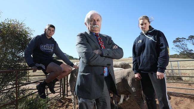 Principal of Cleve Area School Ray Marino with school students Ethan Tomney, 17 grade 12 and Lauren Ferme, 16 grade 11 at Sims Agricultural Training Farm. Picture: Robert Lang