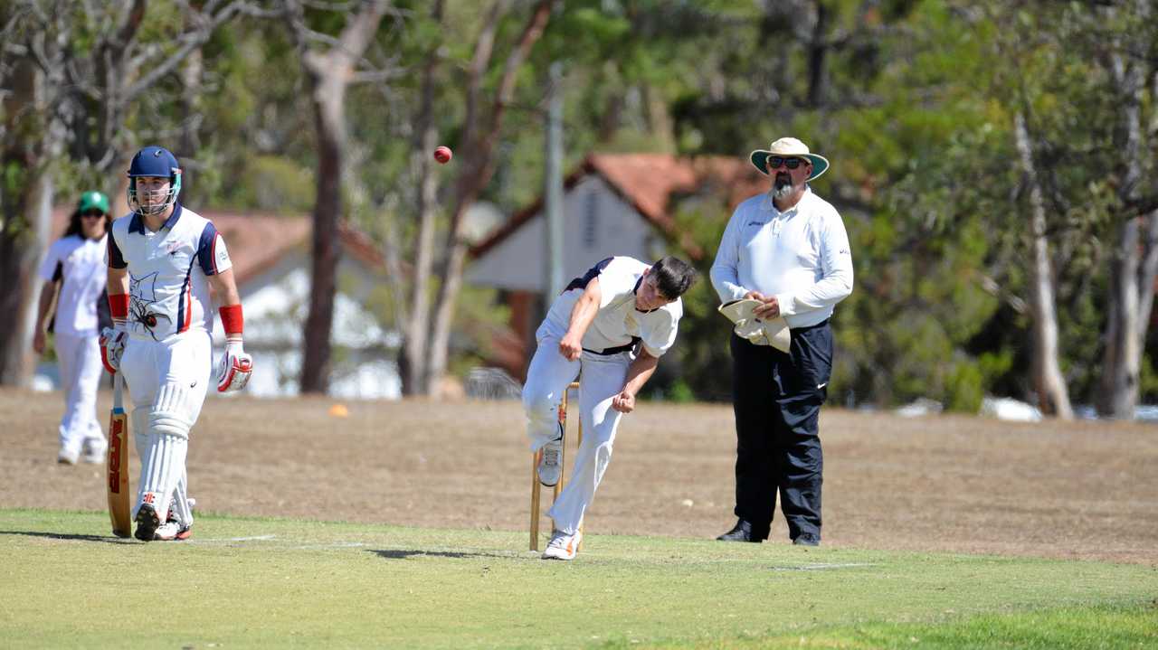 Caleb King bowls in the reserve-grade preliminary final at Mayhew Oval. James Kurtz, who made 26, in backing up at the bowler's end. Picture: Gerard Walsh