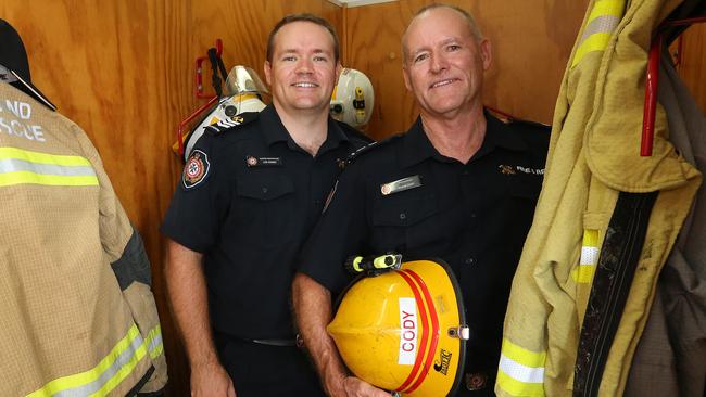 Pictured at the Helensvale Fire Station,  fire fighter Shane Cody who is retiring after 45 years as a firie also pictured with his son Lee Cody. Pic Mike Batterham