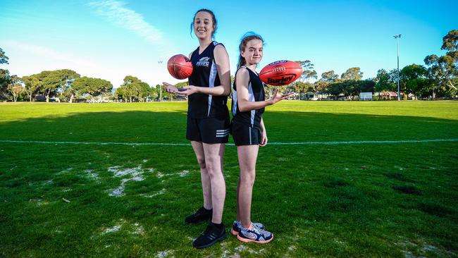 Payneham Norwood Union Football Club players Hayley McAteer and Niamh Maguire. Picture: AAP/Roy VanDerVegt
