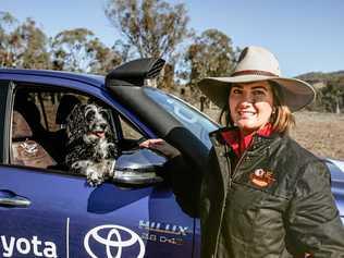 ON THE ROAD: Photographer Edwina Robertson and her dog, Jordie, are spreading awareness of drought-stricken communities. Picture: Edwina Robertson