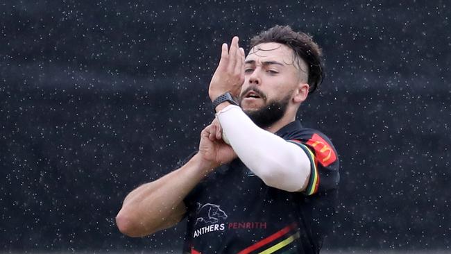 Penrith’s Kaine Balgowan bowls in the wet against St George.