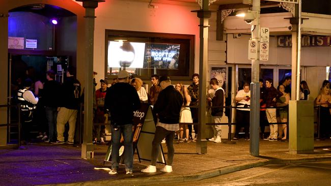 Patrons line up to get into Dog &amp; Duck on Hindley St. Picture: Naomi Jellicoe