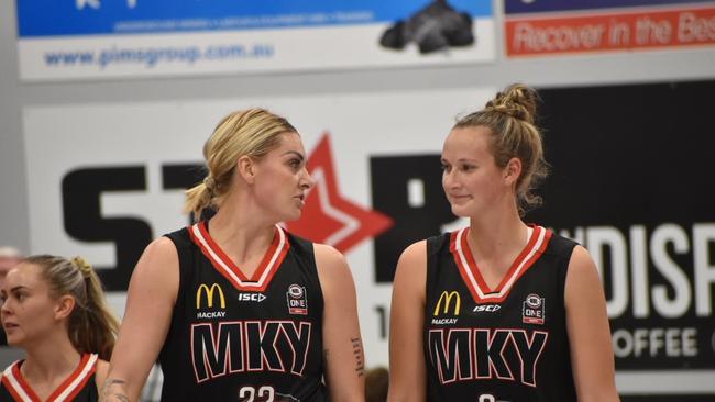 Cayla George (left) and Chelsea Brook during a Mackay Meteorettes game. Picture: Matthew Forrest.