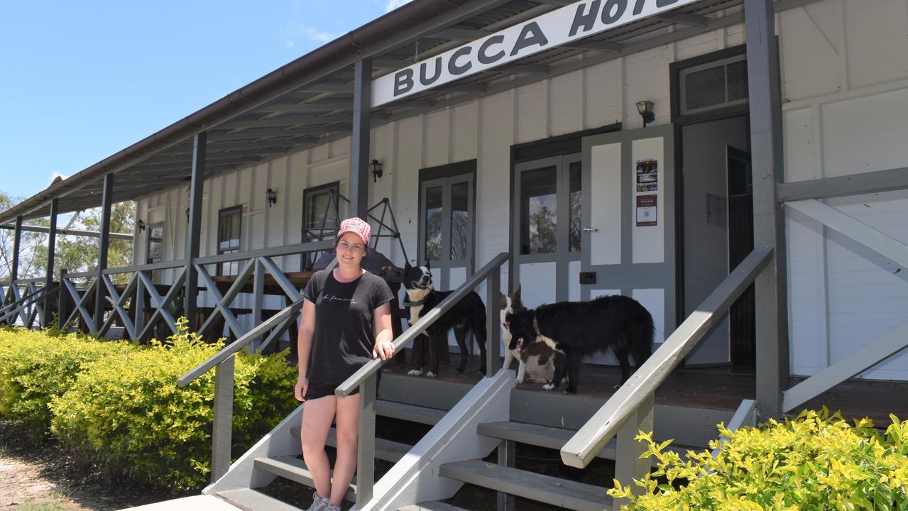 Bucca Hotel publican Sarah Wesener outside the hotel. She was in the building when what she believes was a tornado tore off part of the balcony roof, tossing it into their backyard. The area with the missing roofing is able to be seen on the left of the photo.