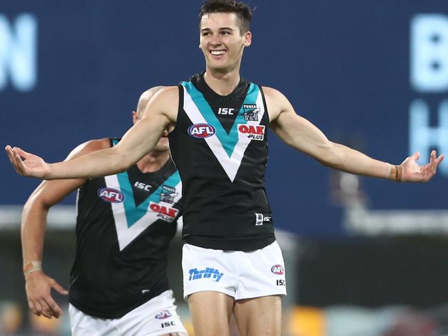 Port Adelaide’s Connor Rozee celebrates a goal during the round three AFL match against  the Brisbane Lions at The Gabba. Picture: Chris Hyde/Getty