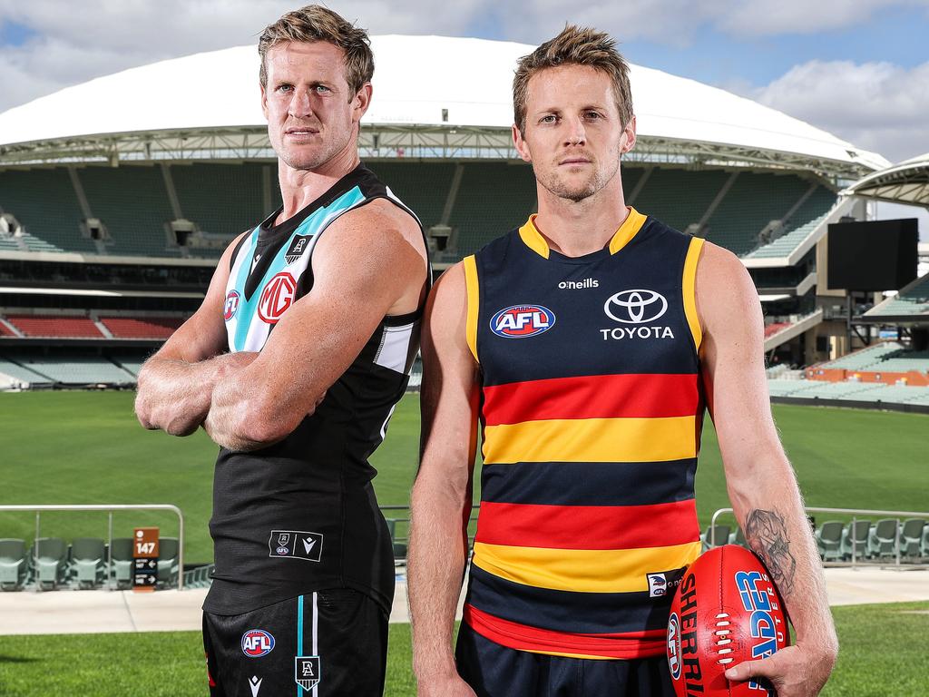 Tom Jonas (Power) and Rory Sloane (Crows). Sloane will lead one of the most inexperienced rosters in the competition. Picture: Sarah Reed/AFL Photos via Getty Images