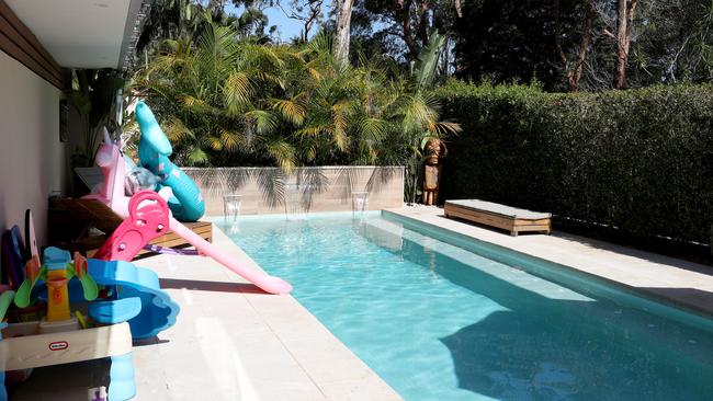 Michael Zirps’ daughters were vying for his attention when Ella slipped into the pool. Picture: Jonathan Ng