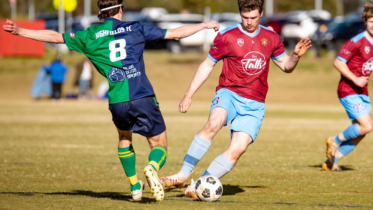 Highfields Josh Mitchell (left) closes down St Albans' Riley Lobwein. Picture: DSL Photography