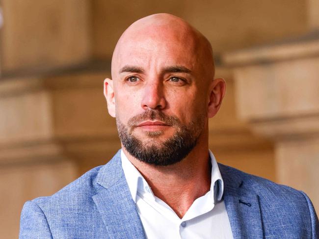 NEWS ADVMatthew Thomson, former SAPOL detective  on DV charges enters the Samuel Way building, Image/Russell Millard Photography