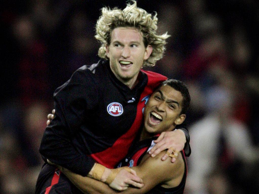 James Hird and Damian Cupido in celebration mode for Essendon.