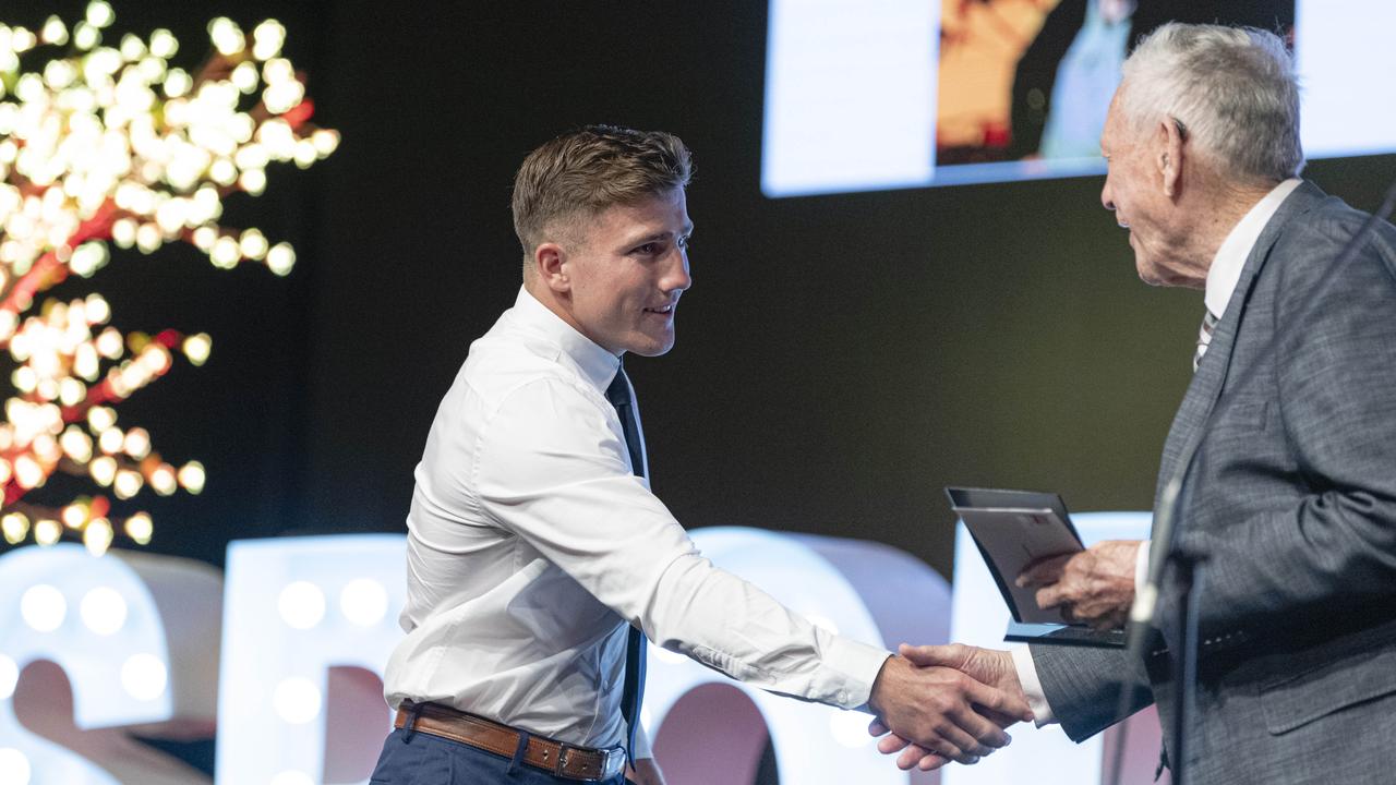 Sports Darling Downs Senior Rising Star award recipient Jackson Griffiths accepts the award from Clive Berghofer at the presentation dinner. Picture: Kevin Farmer