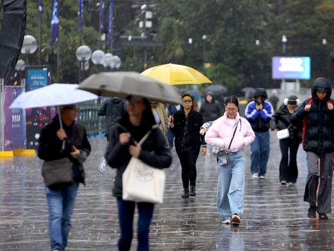 The Bureau of Meteorology says rainfall will ease in Sydney in time for the long weekend, which should be dry in most parts of the state. Picture: NewsWire / Damian Shaw